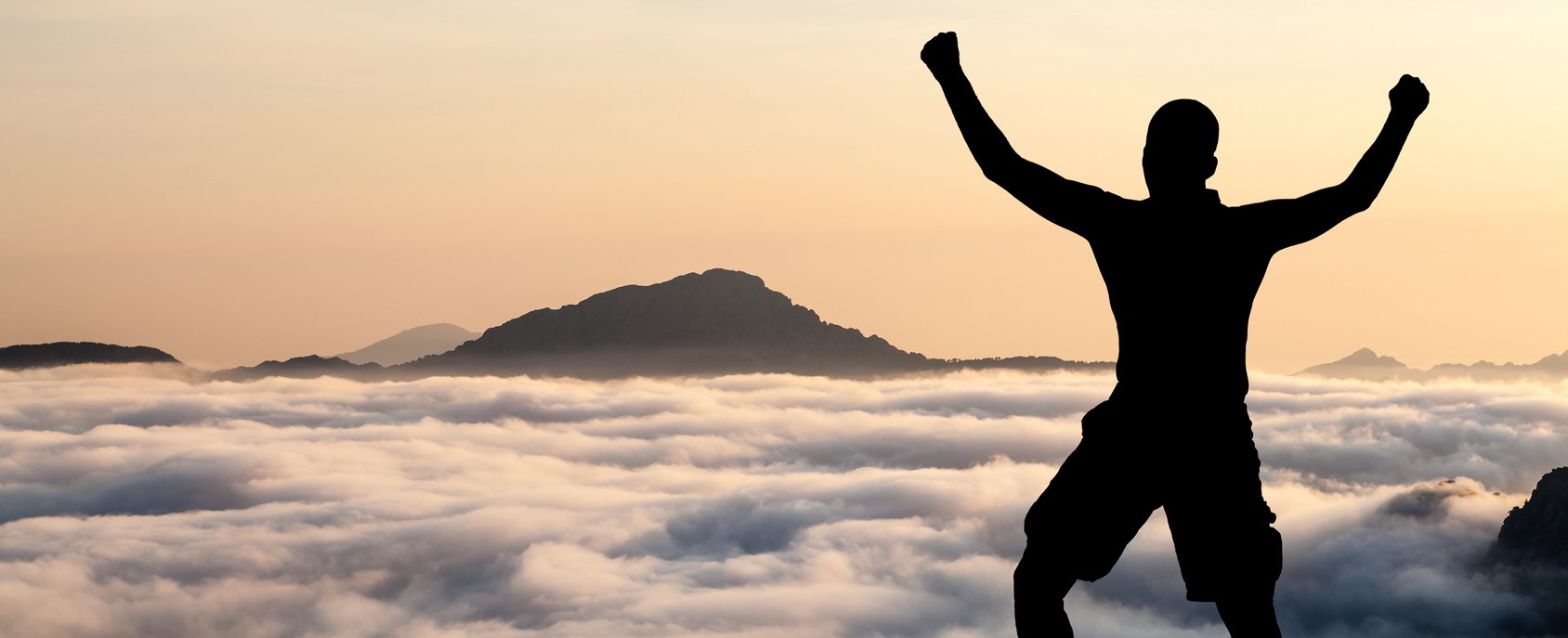 Photo of man with hands up